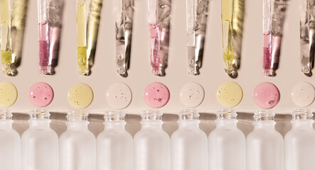 banner samples serum tests glass pipettes with drops of serum on a light beige background