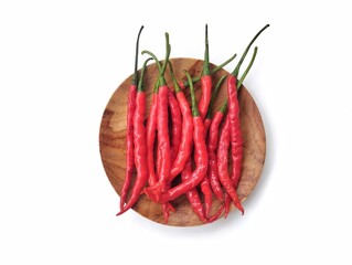 Fresh red hot chili peppers on plate isolated on white background, Food ingredient, Organic farm plant 