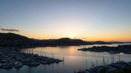 Obraz premium Sunset over Conwy River Estuary with boats in the marina, sky, lake, Wales