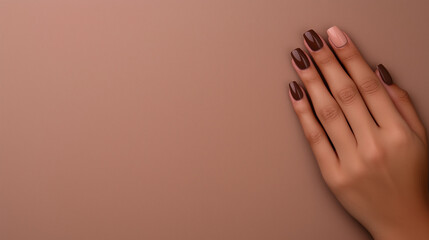  Mocha Mousse nail art with glossy brown tones on hand