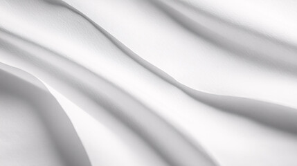 Obraz premium The smooth surface of a white sheet of paper serves as a background.