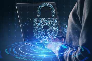 Digital padlock hologram over laptop keyboard symbolizing cybersecurity and data protection on a...