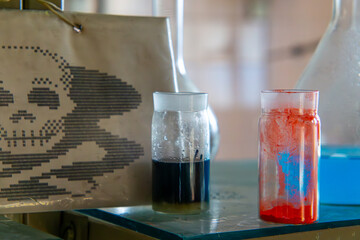 chemical test tubes, chemicals, jars, glass vials for chemical tests. laboratory equipment in abandoned production plants. abandoned laboratory. chemical and biological contamination