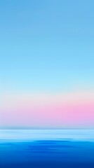 Obraz premium A beautiful blue ocean with a pink and purple sky