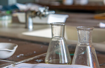 chemical test tubes, chemicals, jars, glass vials for chemical tests. laboratory equipment in abandoned production plants. abandoned laboratory. chemical and biological contamination