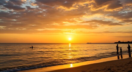 Fototapeta premium Stunning Sunset Beach Scene Family Silhouette Golden Hour