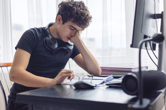 Stressed Out Student. Study Burnout. Overwhelmed. Anxiety. Mental Fatigue. onlinelearning. Overwhelmed Teenager Struggling with Studying and Exam Stress. Learning Difficulties, ADHD, Autism. Copyspace