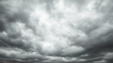 Obraz premium Stormy sky, dark clouds overhead, atmospheric background for weather report