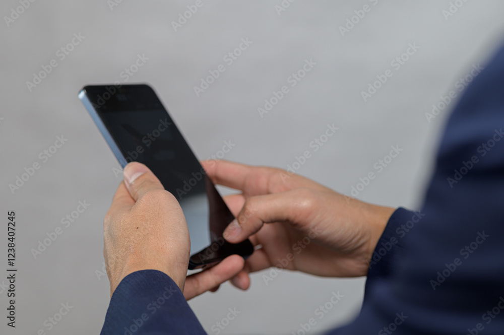 Poster close-up of hands using smartphone in professional setting