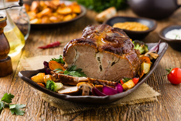 Whole roasted pork neck.