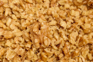 close up of crushed nuts ready to be used to prepare a dessert