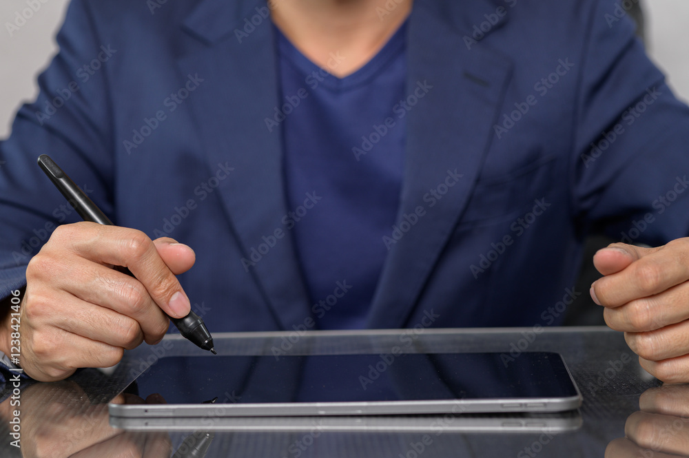 Poster professional man using tablet with stylus in business setting