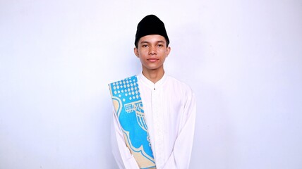 handsome asian muslim youth smiling isolated white background