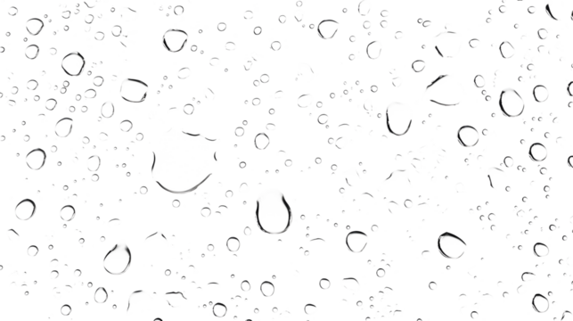 close up view of transparent water droplets and bubbles on a clear glass surface creating an abstract nature inspired background with a fresh pure and tranquil atmosphere