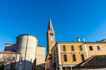 view of the bell tower in the historic center of Portogruaro, Veneto, Italy
