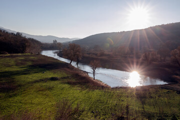 Sunset over the river in the mountains. Balikesir, Turkiye.