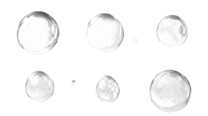 Transparent glass spheres floating on a clean minimalist surface creating a reflective and composition  The clear glossy orbs appear to be filled with liquid