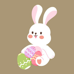 Fototapeta premium A cute bunny sitting with easter eggs.