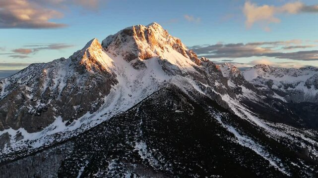 Epic drone video of mountain Maglic in Bosnia and Herzegovina, 4k drone video of snow mountains at sunset