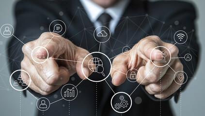 A business professional points towards digital network icons, showcasing advanced technology concepts