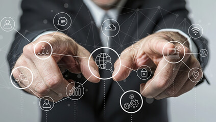 A business professional points towards digital network icons, showcasing advanced technology concepts