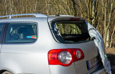 Rear window of a car smashed due to vandalism