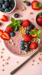 Bowl of granola with yogurt and berries for healthy breakfast.