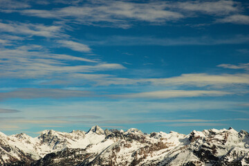 Mountain view. Snow-capped peaks against the blue sky with clouds. Orobie ( Bergamasque Alps ), Lombardy, Italy © Gherzak