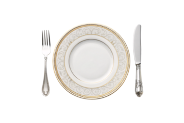 A porcelain set featuring a subtle floral motif in gold, bordered by embossed rims, paired with detailed silver flatware for timeless appeal, isolated on a transparent background