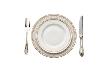 Porcelain dinnerware with interwoven gold patterns on the rim, paired with intricately designed silver-handled cutlery for a regal dining experience, isolated on a transparent background
