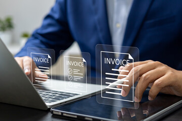 E-Invoice and Digital billing concept, Businessman using laptop to manage electronic statements on...