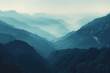 Fototapeta premium A tranquil mountain landscape shrouded in mist, featuring layered hills and a serene atmosphere.