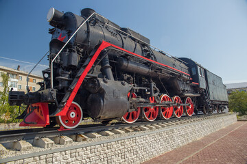 Wheels of an old locomotive. Chassis of a steam locomotive.
