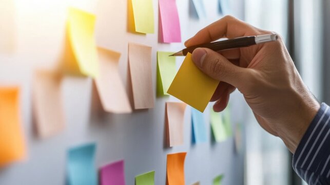 Creative brainstorming session with sticky notes on board