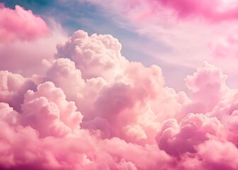 Fantasy sky with sugar cotton pink pastel clouds in a dreamy background
