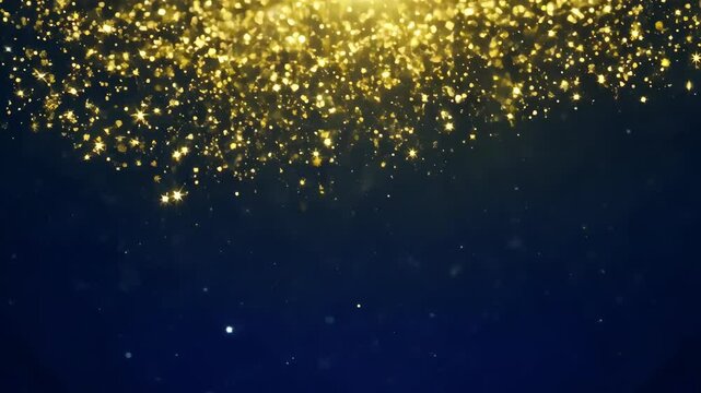 Golden glitter particles falling against a dark background