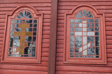 Windows in historic wooden Lemko Orthodox church in Tylicz from 1743, dedicated to Saints Kosmas...