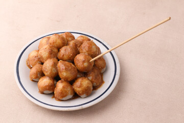 Delicious Peanut Sauce Meatballs on a Plate
