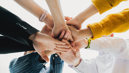 Panoramic teamwork business join hand together,Teamwork power,unity concept.group of friends put...