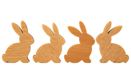 Four wooden easter bunnies creating a festive border on transparent background