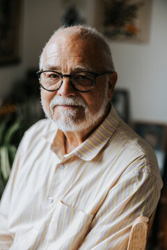 Portrait of senior male with white beard at nursing home