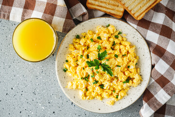 Scrambled Eggs and Juice Delicious Breakfast Meal with Toast and Fresh Ingredients