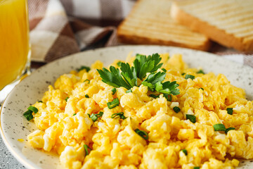 Scrambled Eggs and Juice Delicious Breakfast Meal with Toast and Fresh Ingredients