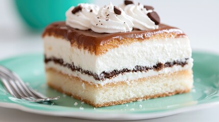 Delicious layered cake with caramel, cream, and chocolate