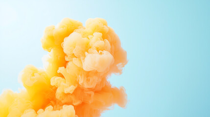 Vibrant orange ink splash against light blue background creates stunning visual