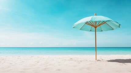 A captivating scene showcasing a turquoise beach umbrella standing alone on a sandy shore, inviting vacationers to enjoy the peacefulness of the gentle waves and clear sky.