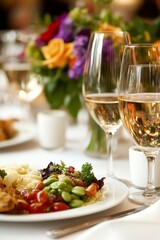 Luxurious table setting features colorful dishes and fine white wine, surrounded by vibrant flowers, creating an inviting atmosphere for guests to enjoy
