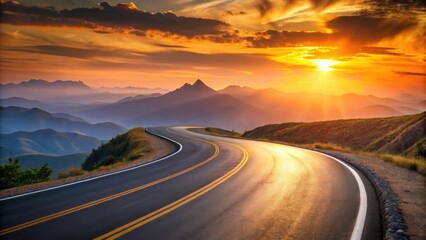 Naklejka premium Scenic Winding Road Through Majestic Mountains at Sunset