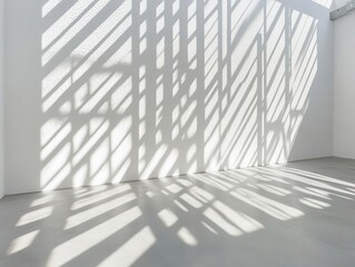 minimalist white photography studio interior with dramatic diagonal shadow patterns cast through invisible windows, creating geometric shapes on clean walls