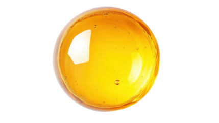 Golden honey sphere reflecting light on transparent background